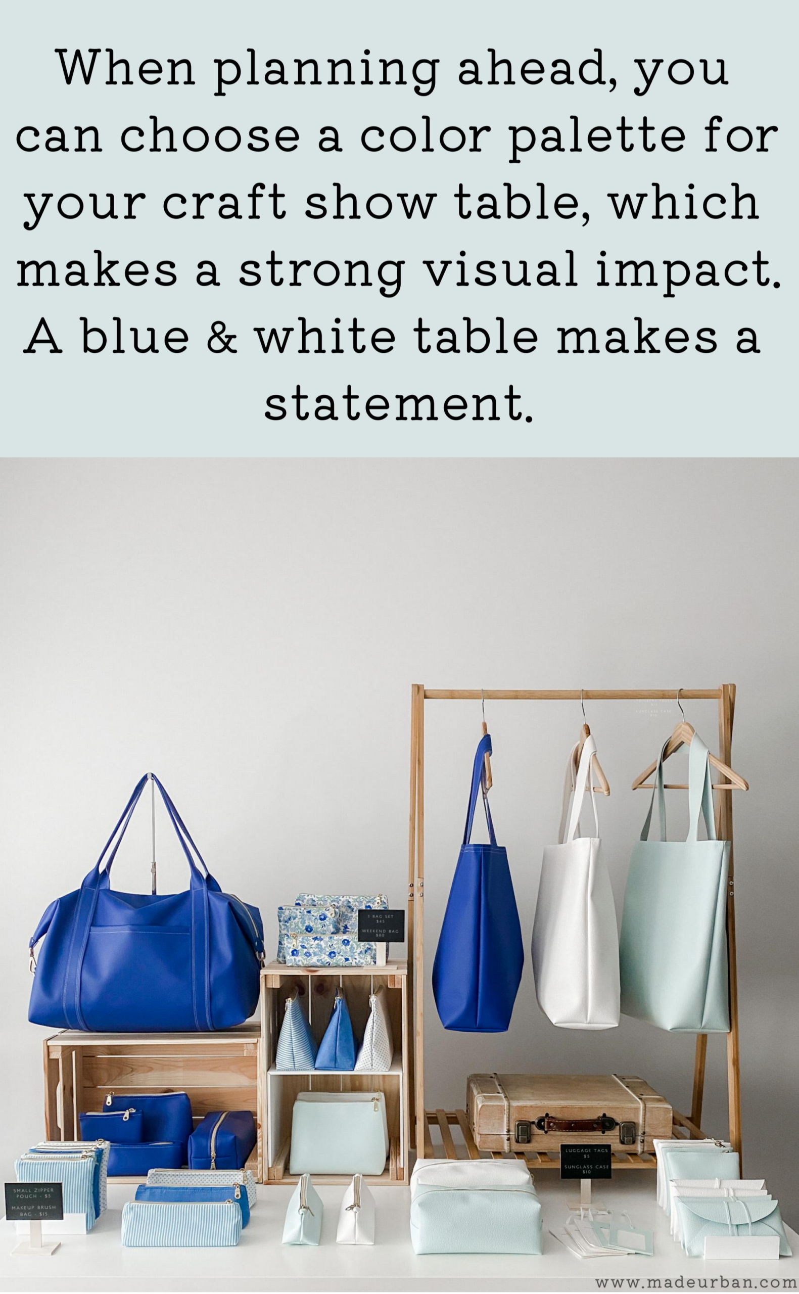 Blue and white products on a craft show table.