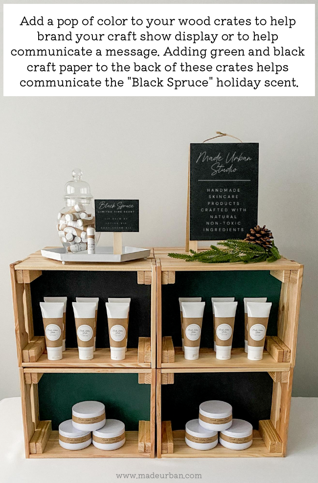 Color added to wood crates in a craft show display